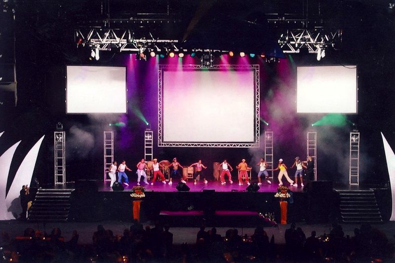 Gala stage with truss, three screens and moving lights